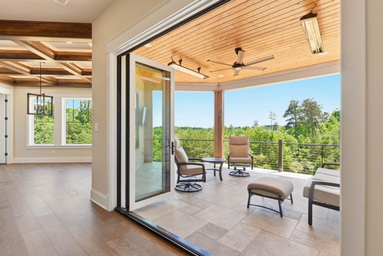 Knoxville custom home — covered outdoor patio with stone and timber — Seigler Custom Homes
